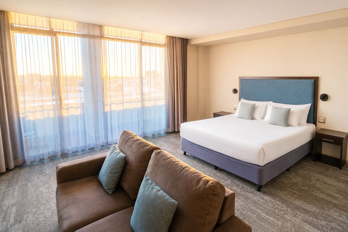 Deluxe Room 1 King Bed with Spa and Balcony | Premium bedding, minibar, desk, blackout drapes