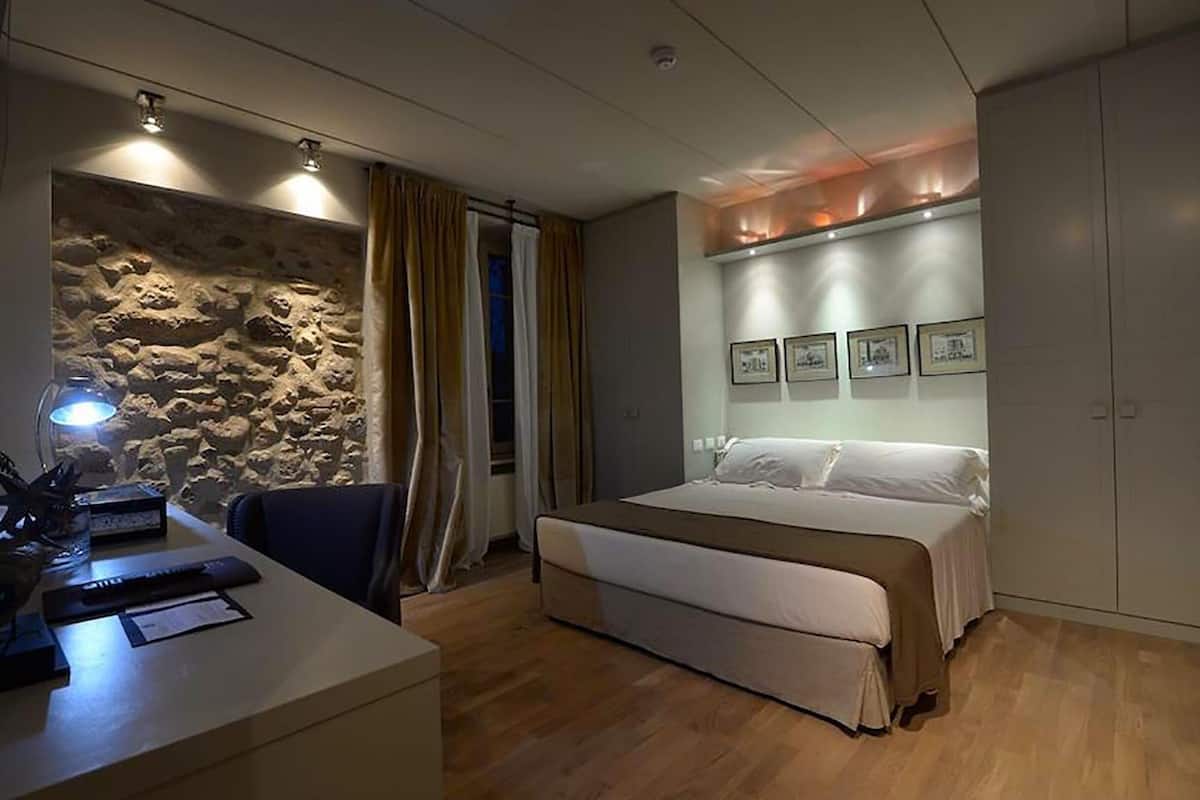 superior room | premium bedding, minibar, in-room safe, individually decorated