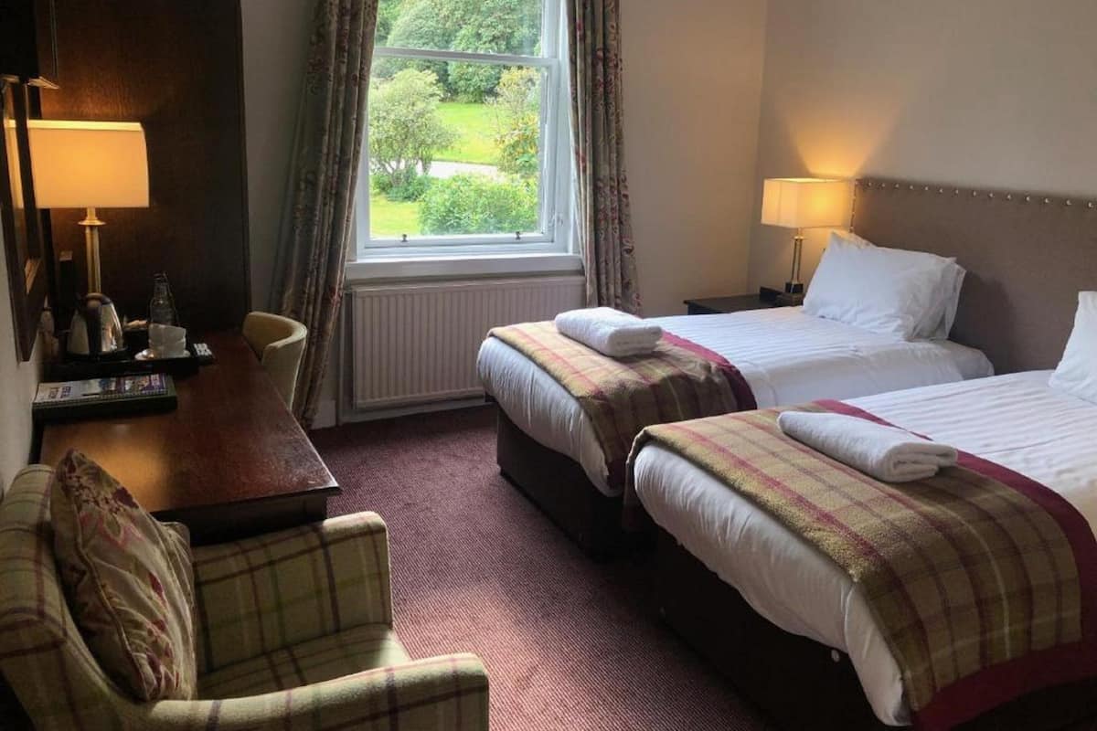 Standard Twin Room, 2 Single Beds | Desk, free WiFi, individually decorated, bed sheets