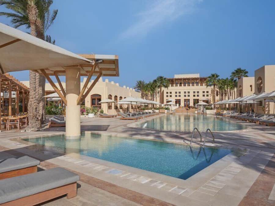 2 outdoor pools, pool umbrellas, pool loungers