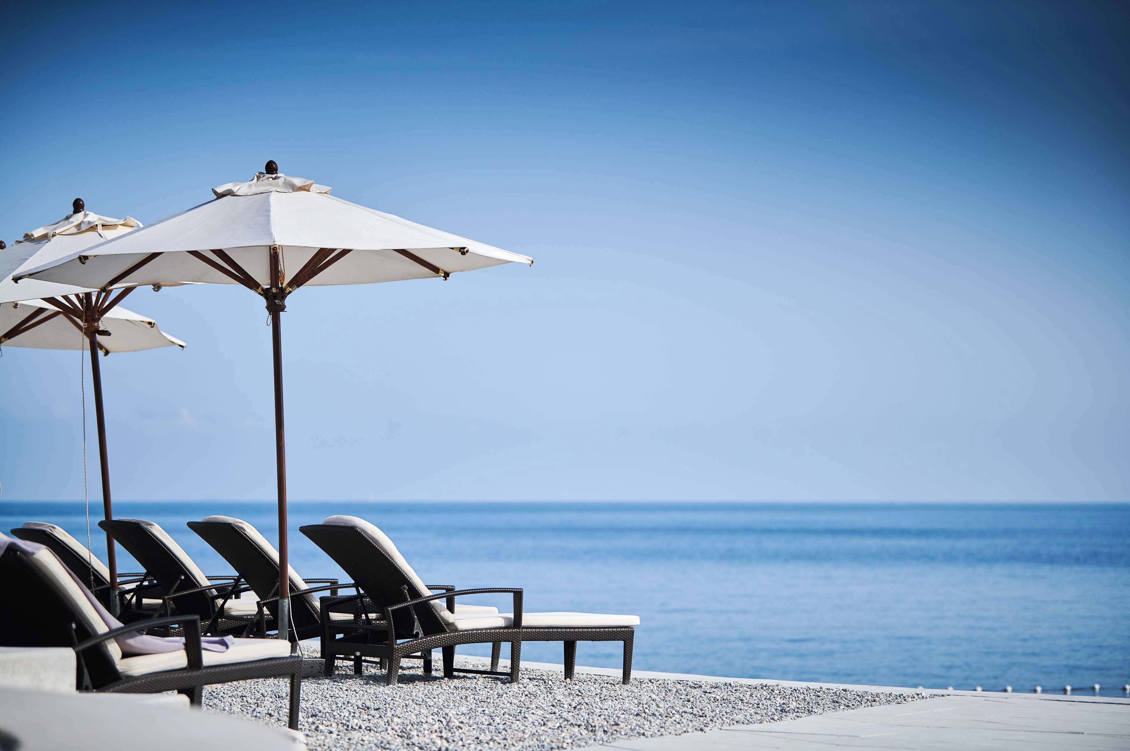 private beach, white sand, free beach shuttle, beach cabanas