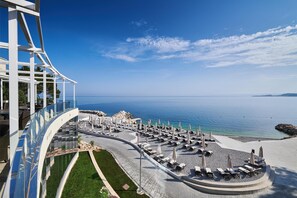 Private beach, white sand, free beach shuttle, beach cabanas