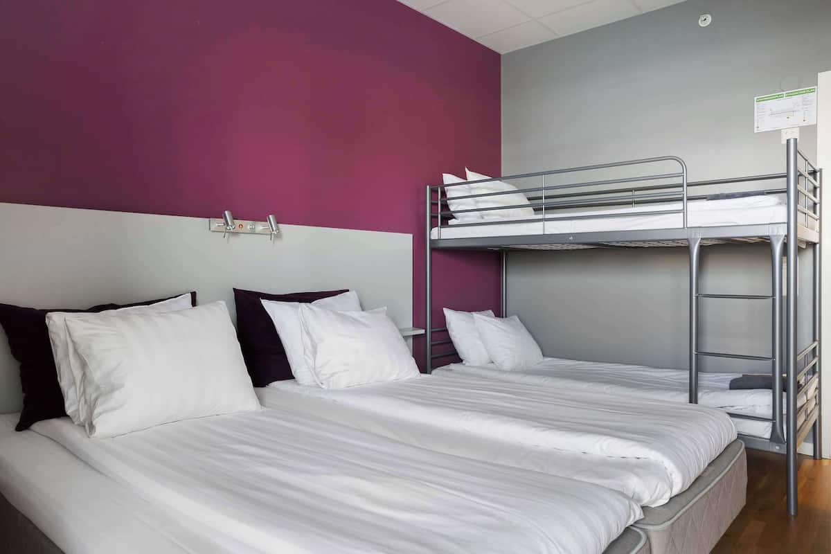 Pillow-top beds, blackout curtains, iron/ironing board (on request)