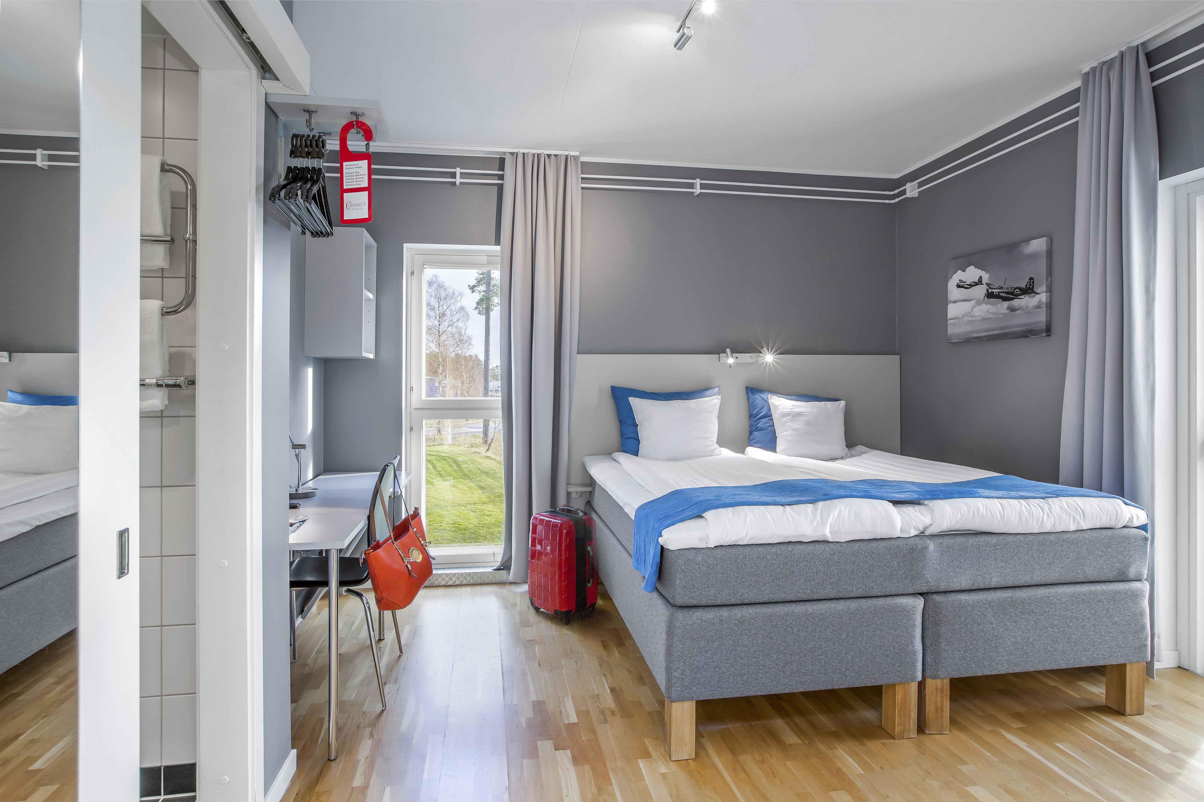 business double room | 1 bedroom, pillow-top beds, blackout curtains, iron/ironing board