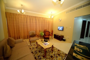Appartement, 2 chambres | Aire de séjour