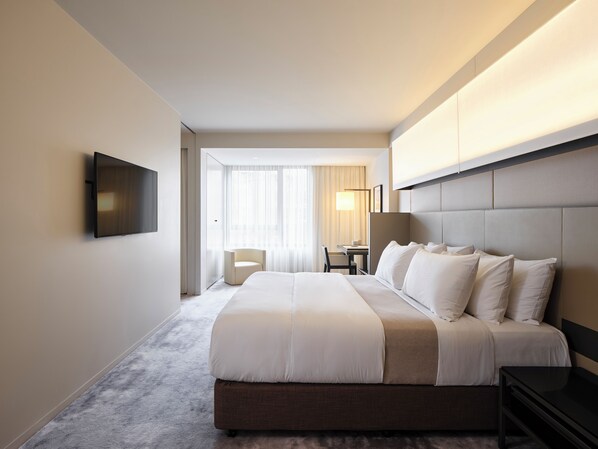 Premium bedding, down duvets, pillow-top beds, minibar