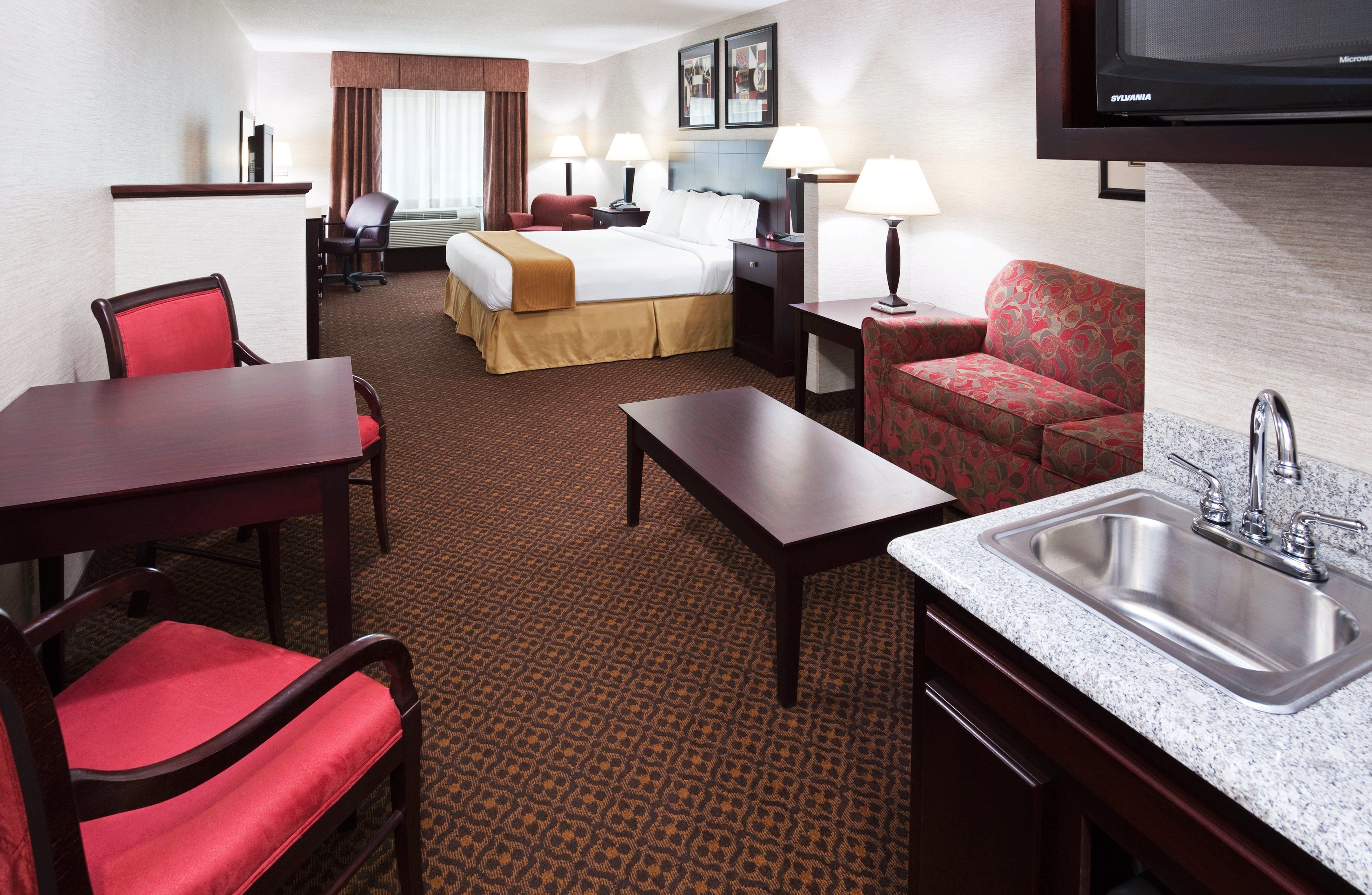 desk, laptop workspace, blackout curtains, iron/ironing board