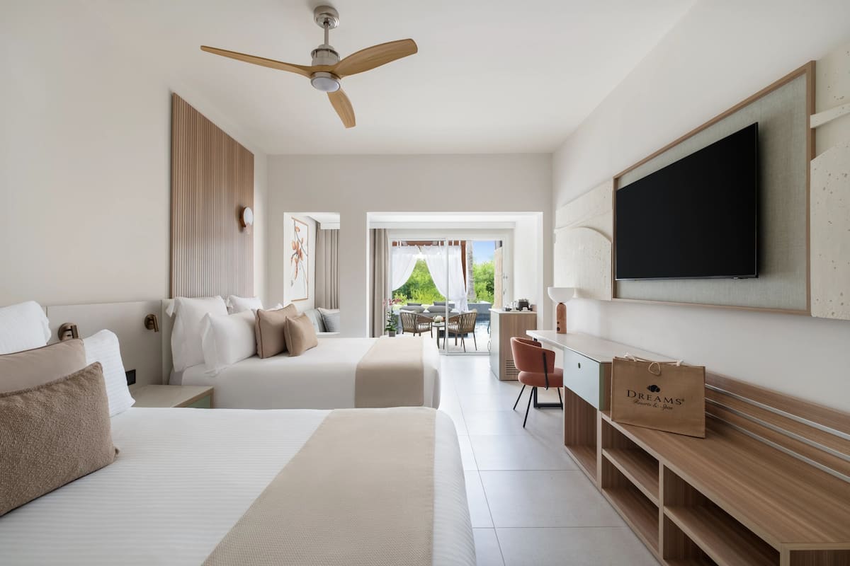 Preferred Club Junior Suite Swim Out Double | 1 dormitorio y ropa de cama de alta calidad