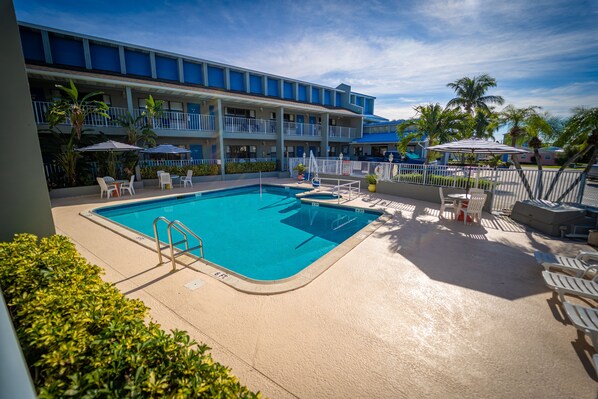 2 outdoor pools, open 7:00 AM to 7:00 PM, pool umbrellas, sun loungers