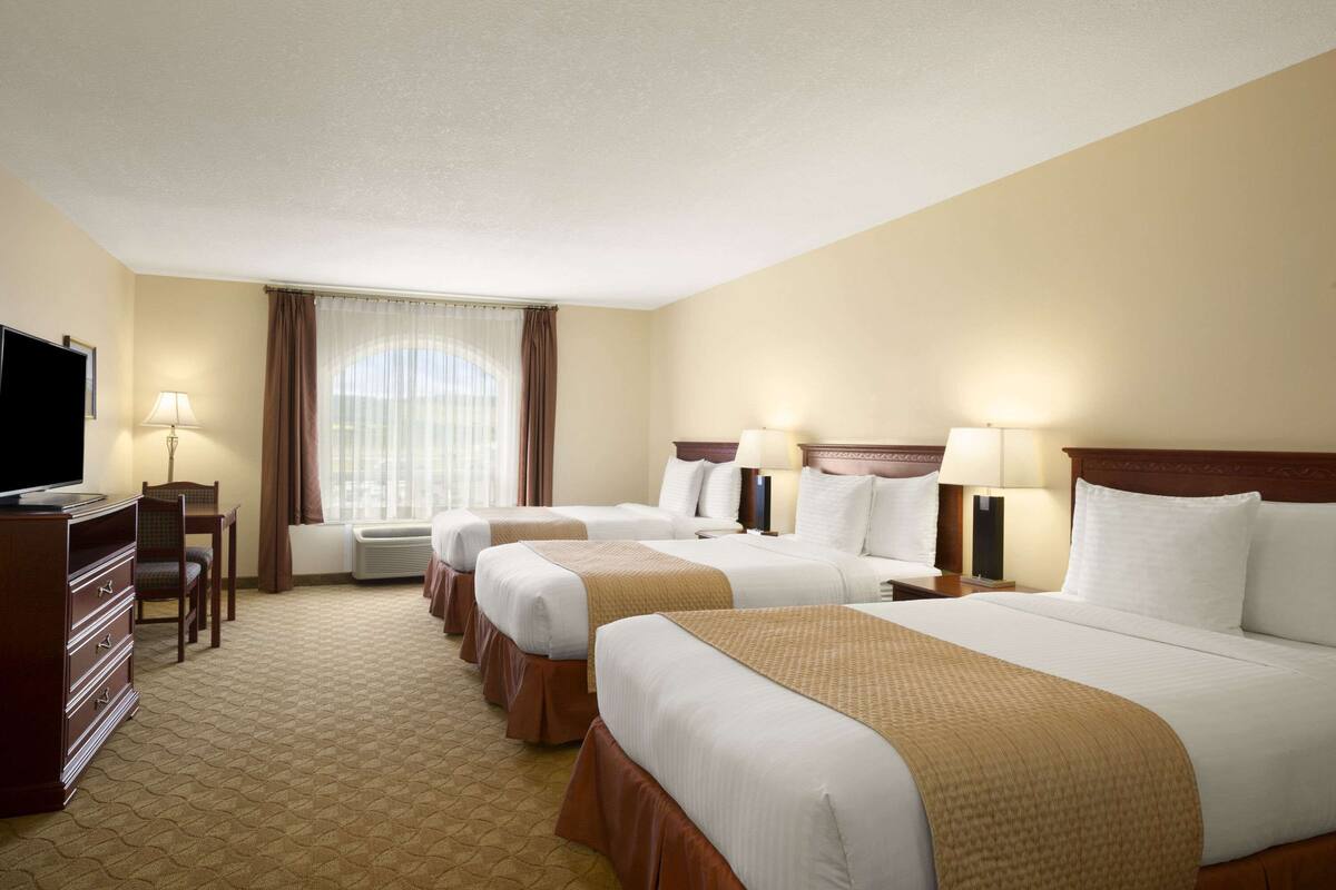 room, multiple beds, non smoking | desk, blackout curtains, iron/ironing board, free wifi