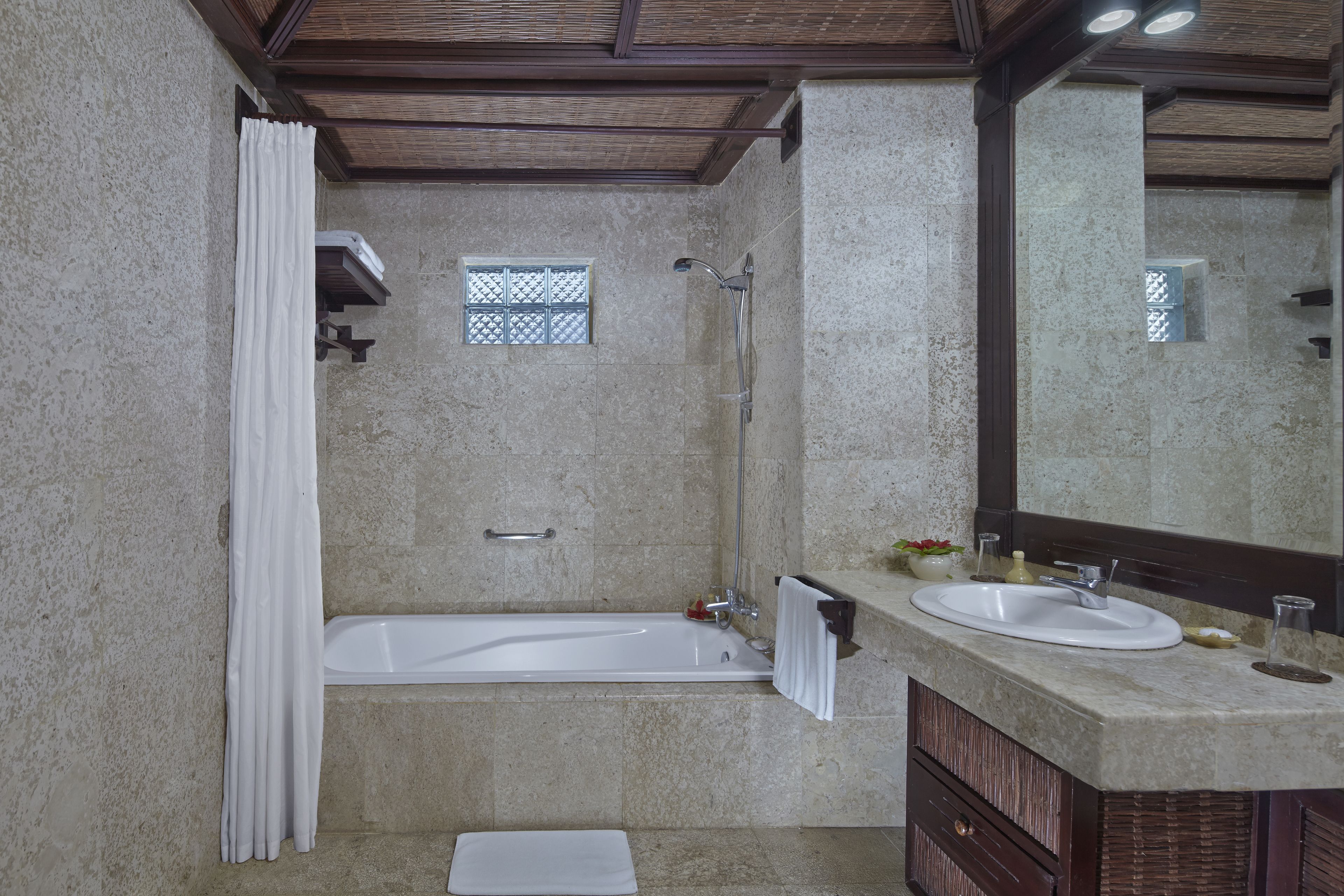 combined shower/bathtub, deep-soaking bathtub, free toiletries