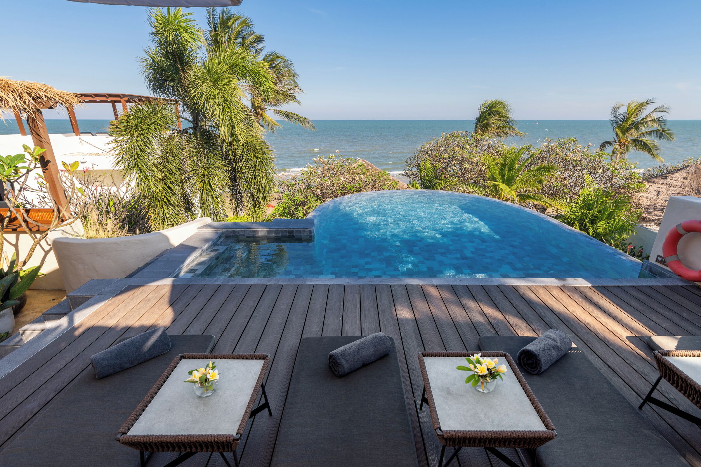 outdoor pool, pool umbrellas, pool loungers