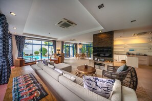 4BR Beachfront Pool Villa | Vardagsrum | En iPod-dockningsstation