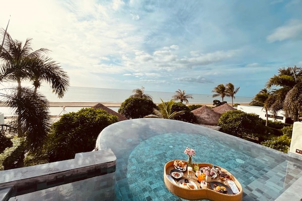 Outdoor pool, pool umbrellas, sun loungers
