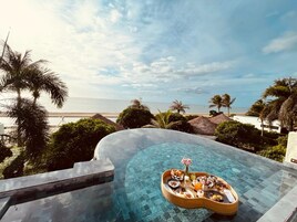 Outdoor pool, pool umbrellas, sun loungers
