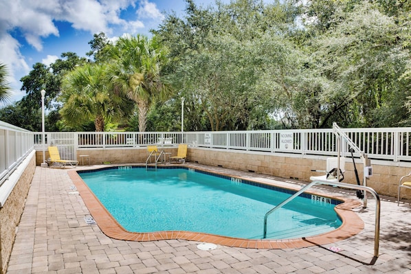 Outdoor pool, open 7:00 AM to 10:00 PM, sun loungers