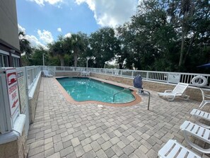 Outdoor pool, open 7:00 AM to 10:00 PM, sun loungers