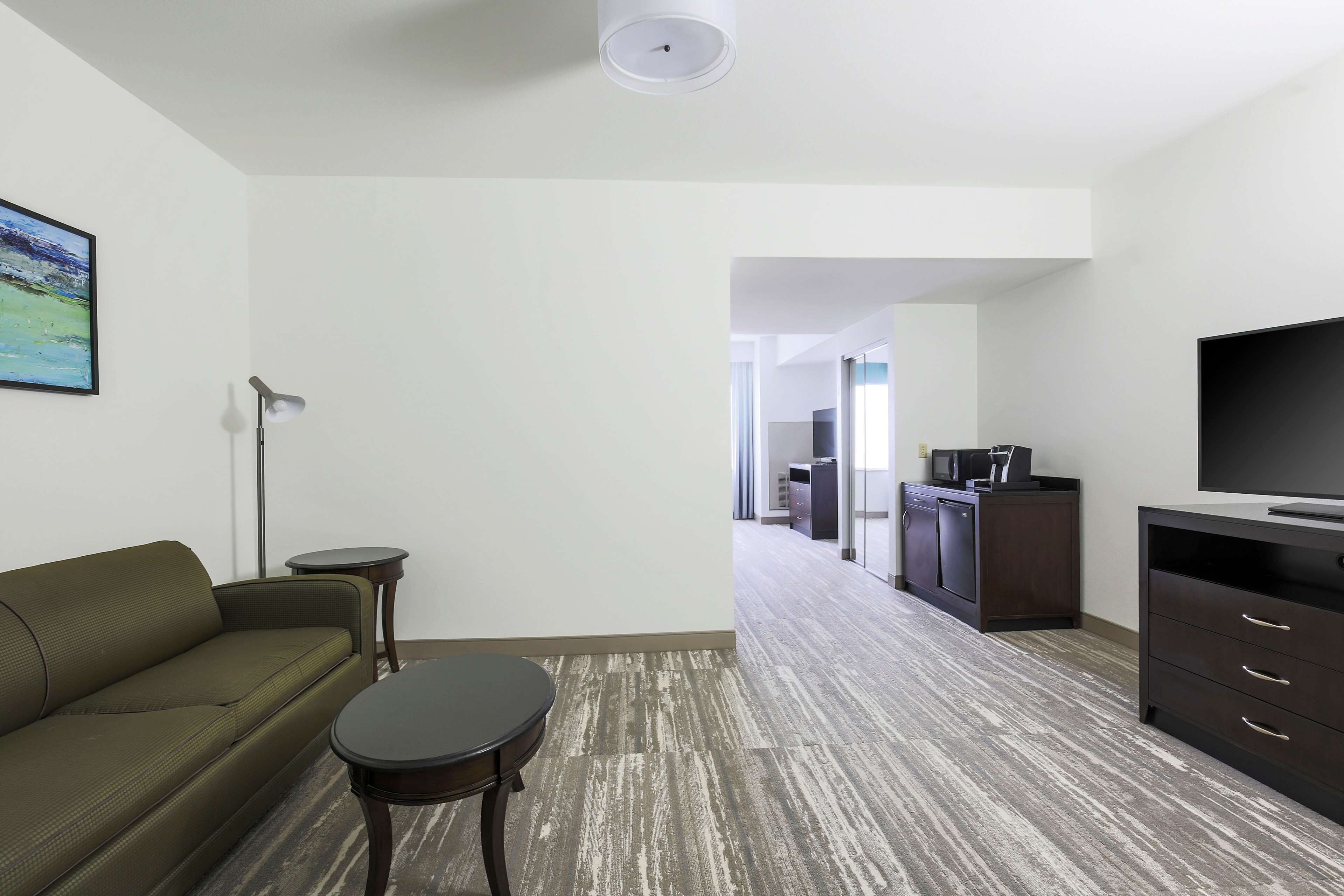 one king evolution suite | living area | 42-inch lcd tv with cable channels, tv, mp3 dock