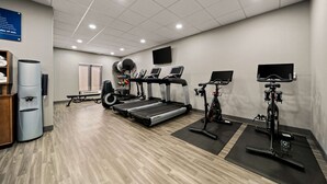 A gym with treadmills, stationary bikes, and exercise equipment. - Hampton Inn Suites Opelika I85 Auburn Area (Opelika)