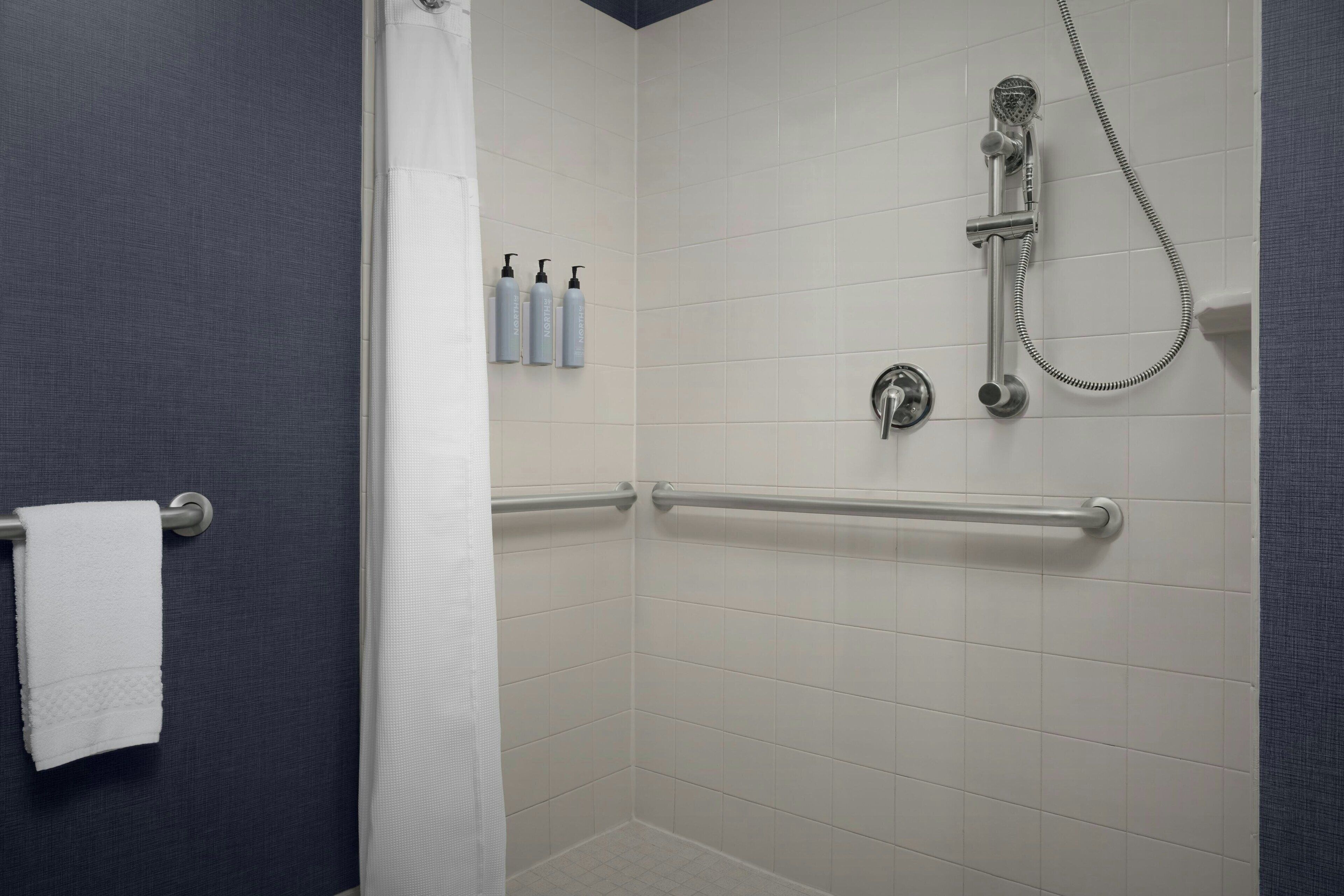 combined shower/bathtub, free toiletries, hair dryer, towels
