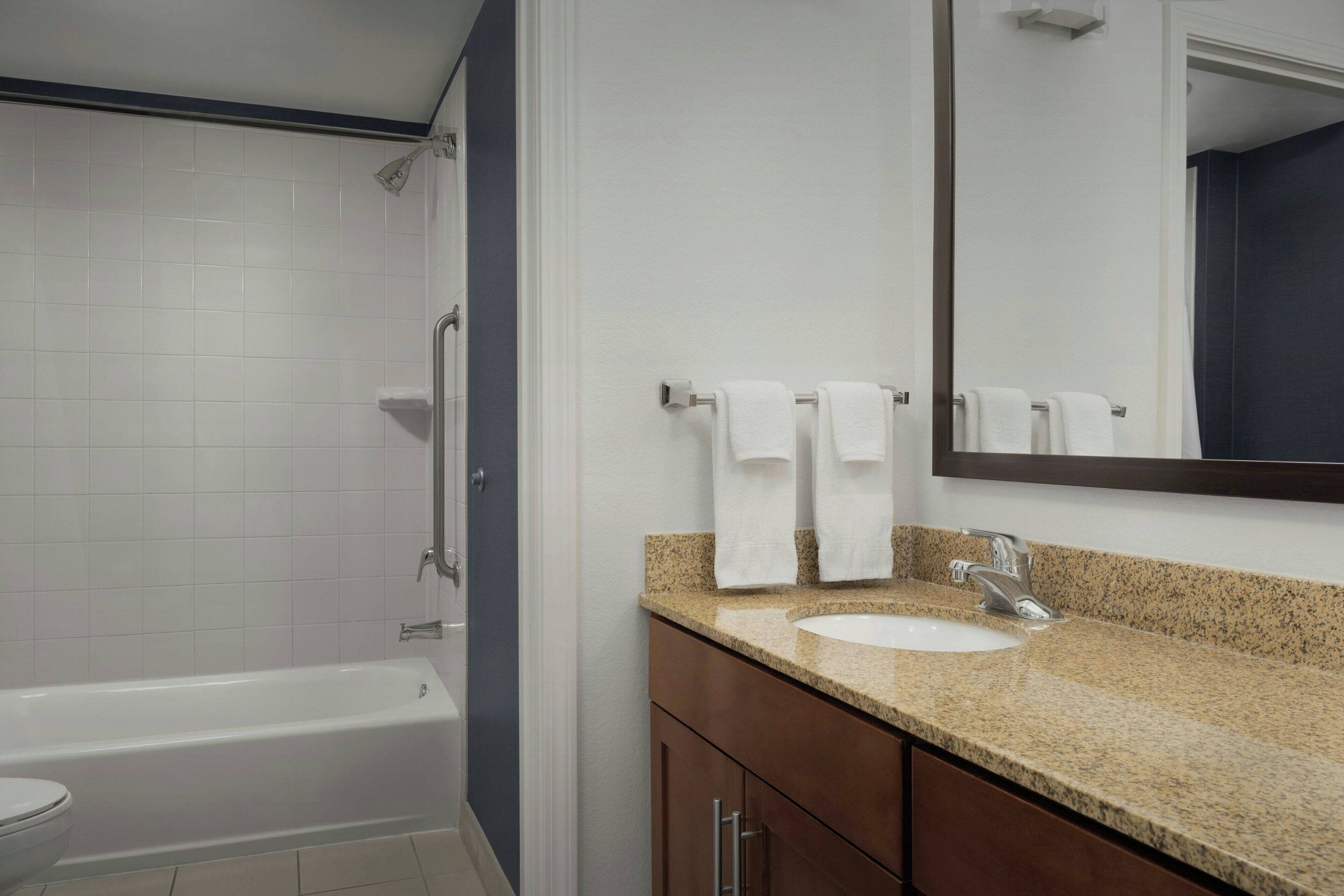 combined shower/bathtub, free toiletries, hair dryer, towels