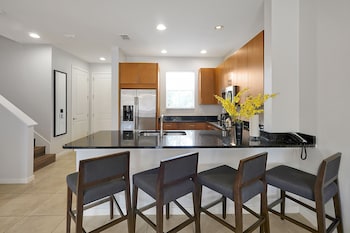 Full-size fridge, microwave, oven, stovetop at Regal Oaks Resort Vacation Townhomes by IDILIQ