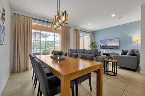 50-inch LCD TV with cable channels, TV, DVD player - Regal Oaks Resort Vacation Townhomes by IDILIQ (Kissimmee)