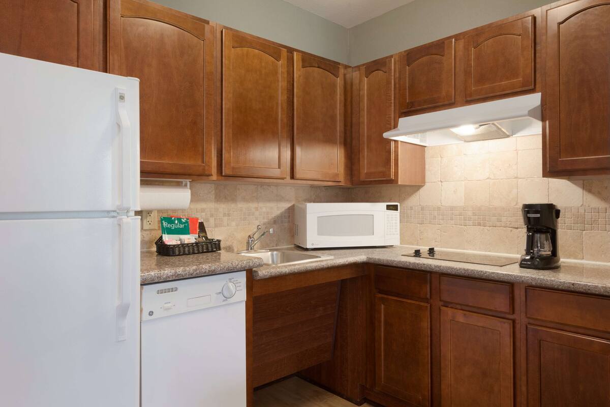 desk, laptop workspace, blackout curtains, iron/ironing board