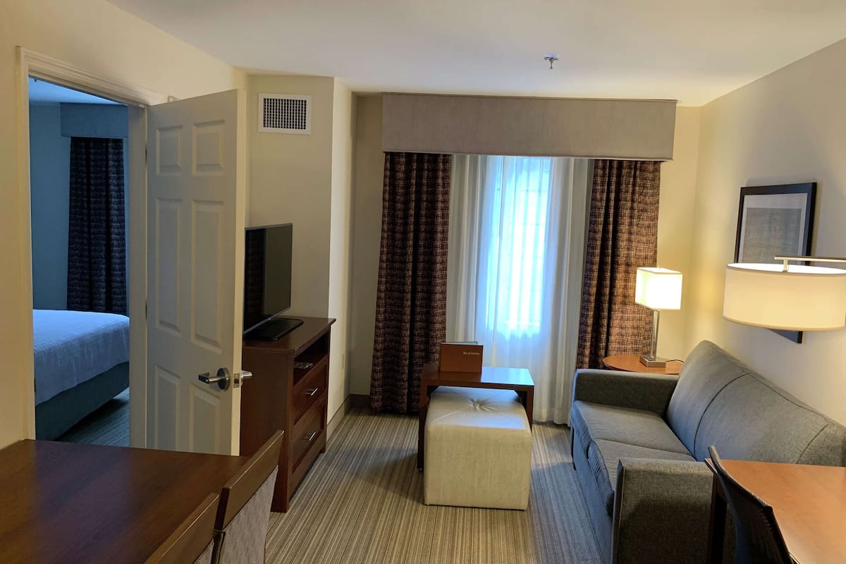 suite, 1 king bed, accessible, bathtub | desk, laptop workspace, blackout curtains, iron/ironing board