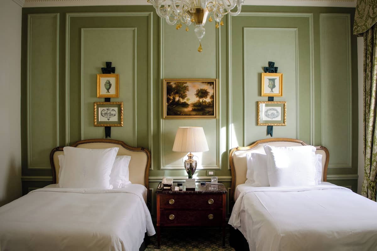 Premium bedding, down comforters, minibar, in-room safe