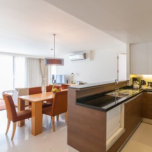 Two Bedroom Executive | Living area | 42-inch flat-screen TV with cable/satellite TV channels, TV, DVD player - Oakwood Residence Sukhumvit 24 Bangkok (Bangkok)