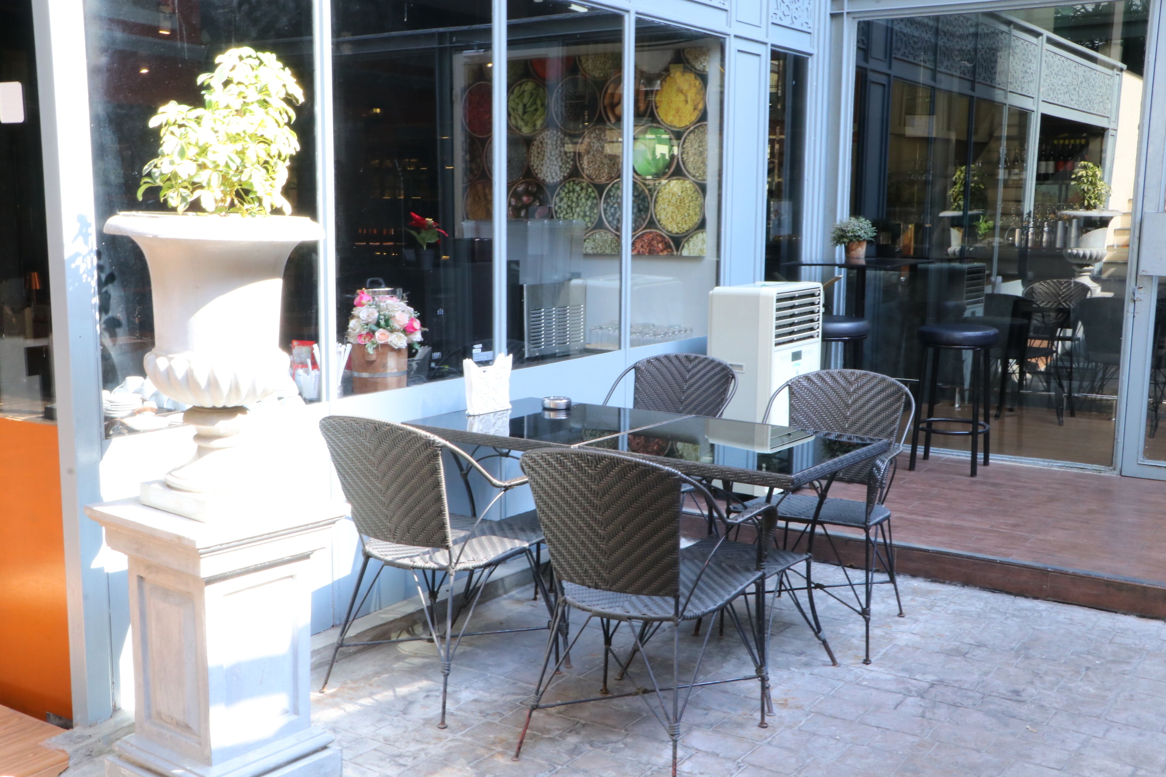 breakfast, lunch, dinner served; indian cuisine, al fresco dining