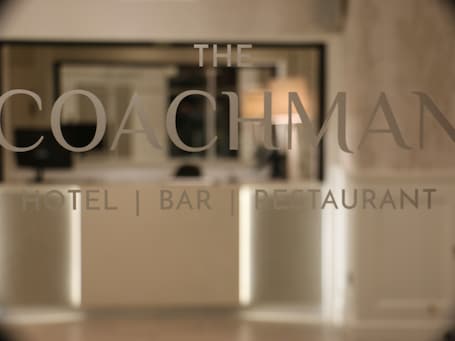 Lobby. Coachman Hotel