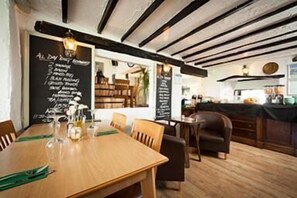 Breakfast, lunch, dinner served; local cuisine 