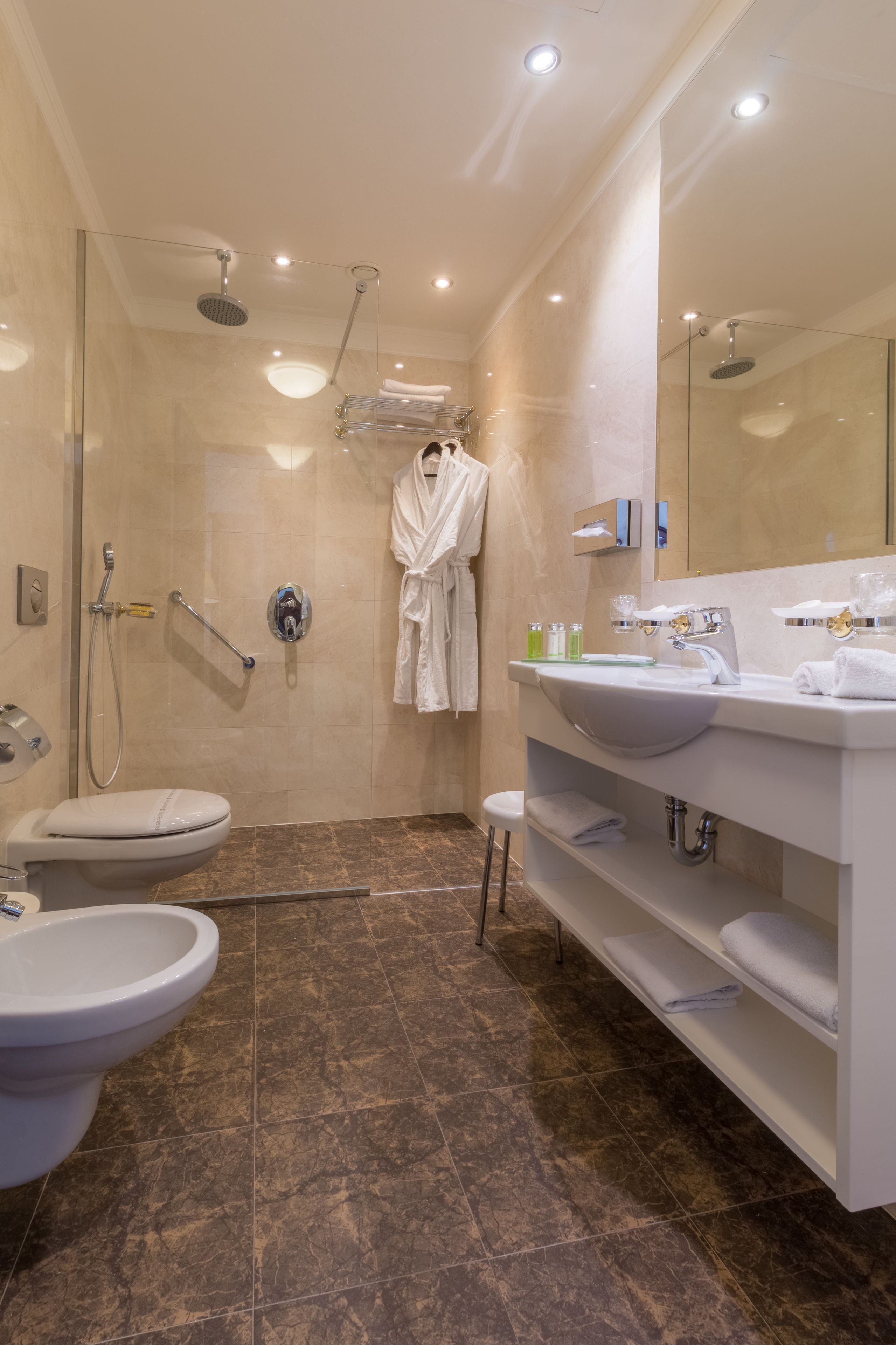deluxe single room | bathroom | free toiletries, hair dryer, bathrobes, slippers
