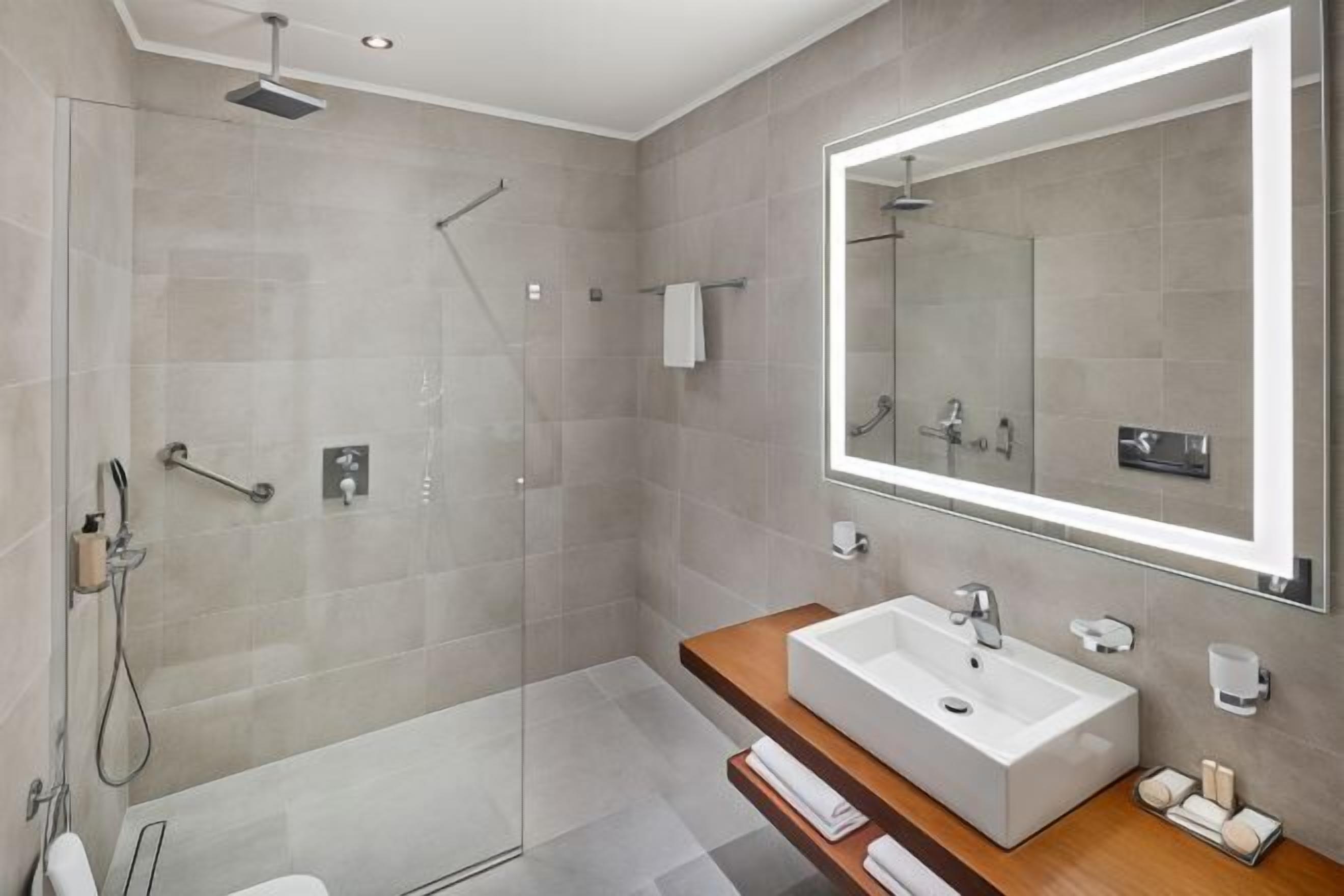 Bathroom | Hair dryer, bathrobes, slippers, towels