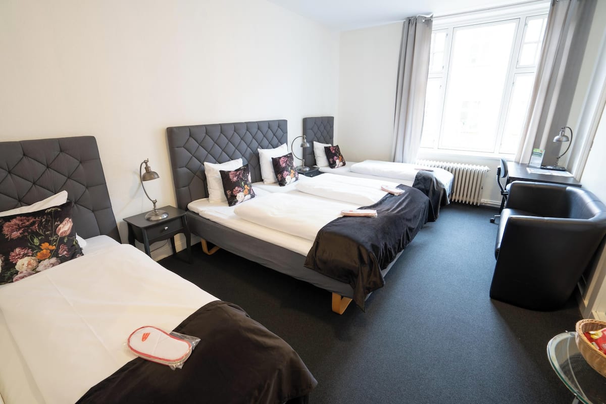 Economy Quadruple Room | 1 bedroom, desk, iron/ironing board, cribs/infant beds