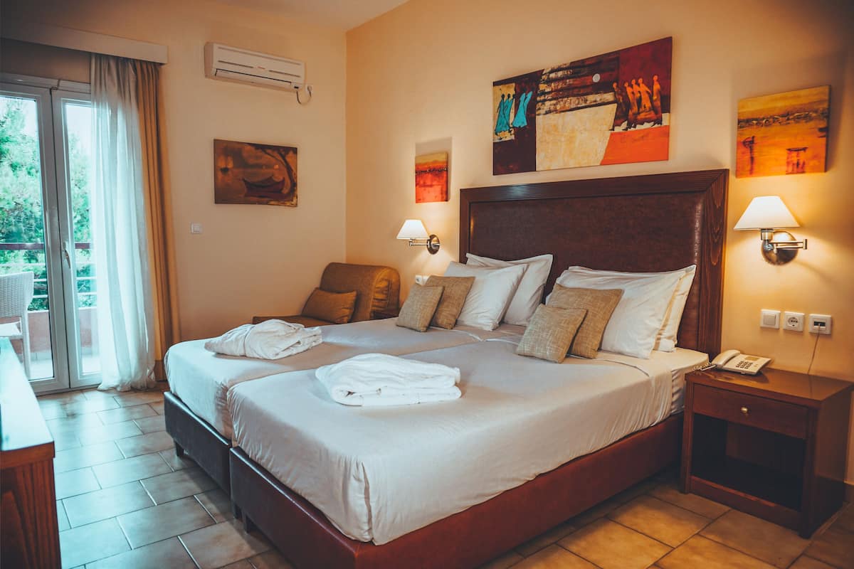 Premium bedding, down comforters, memory foam beds, in-room safe