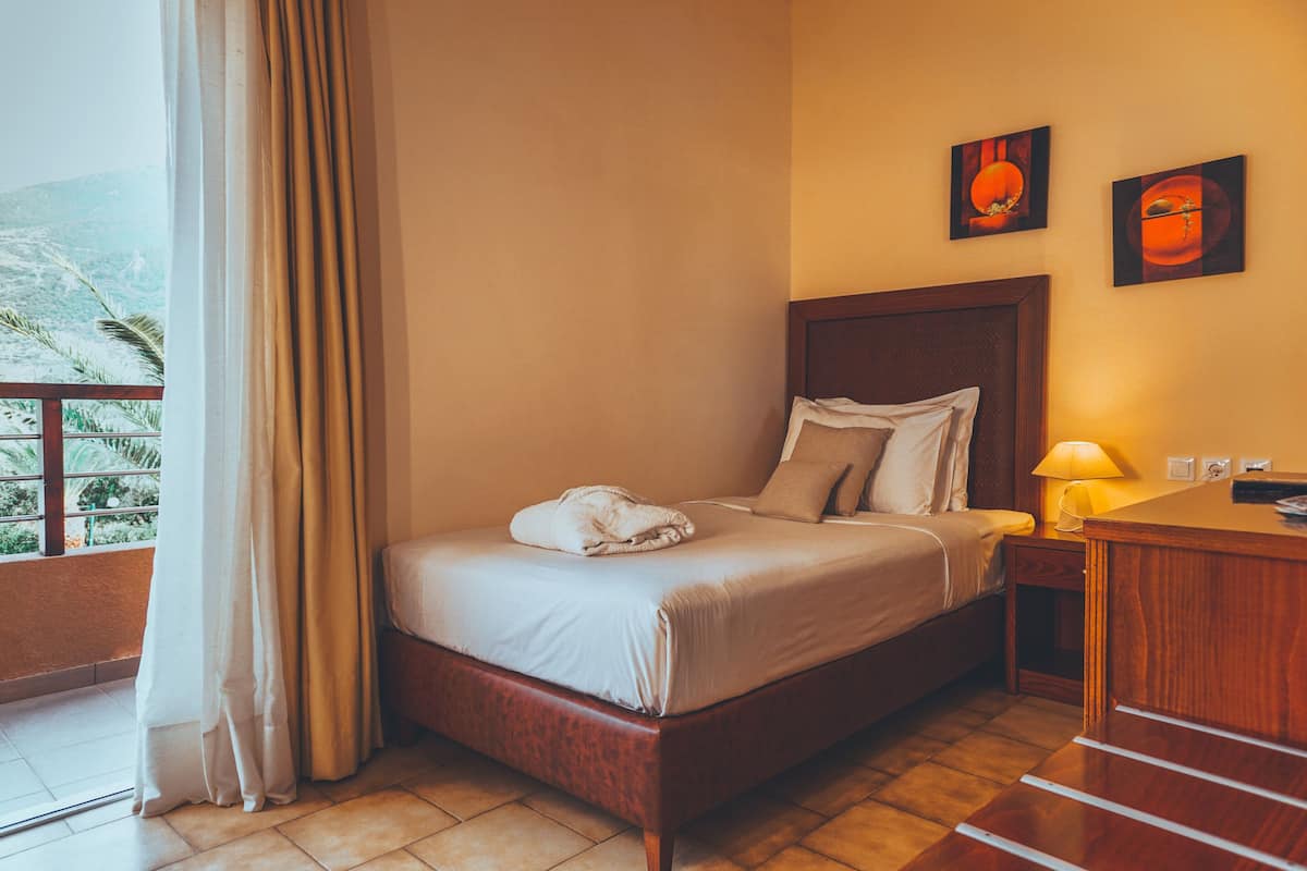 Premium bedding, down comforters, memory foam beds, in-room safe