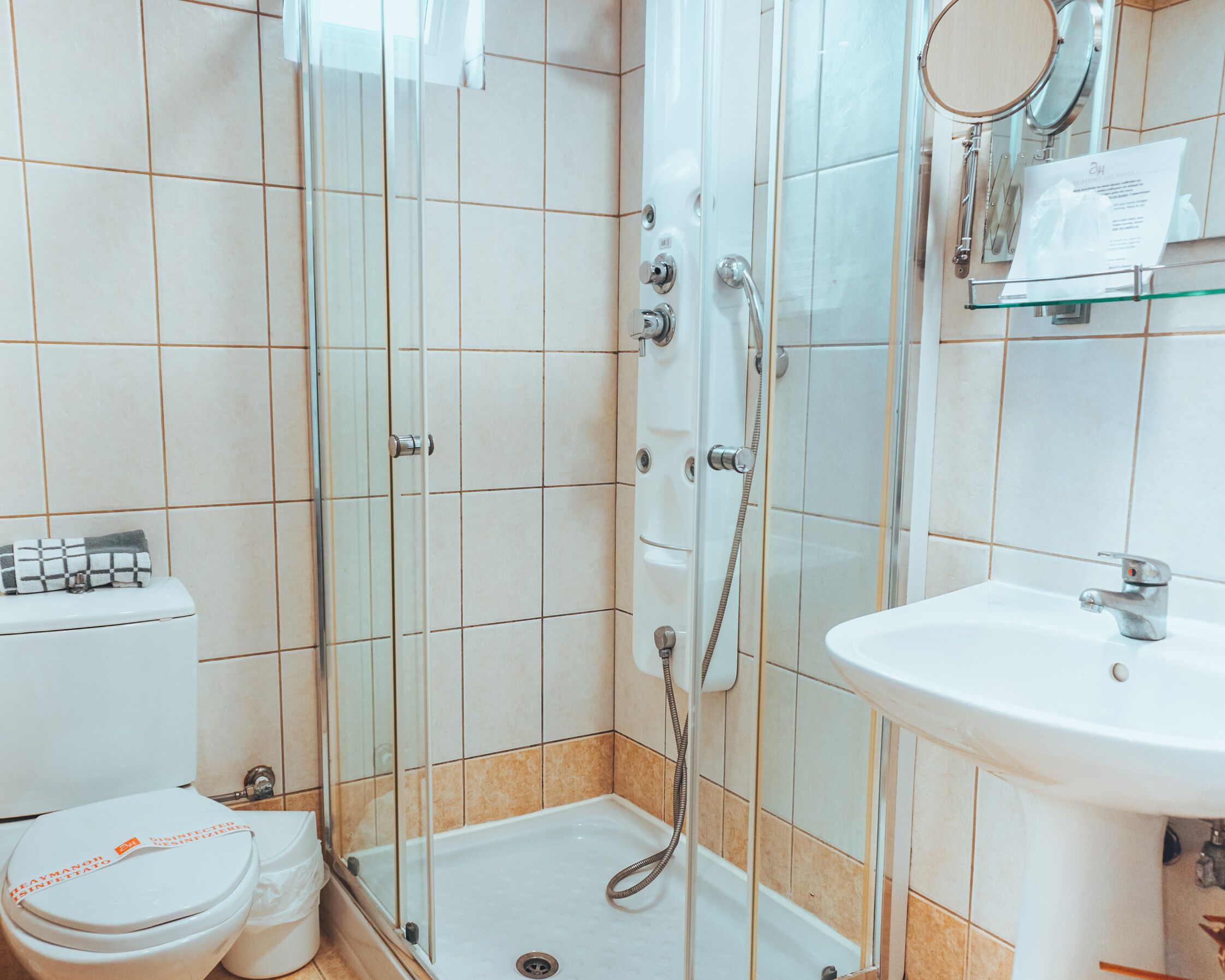 junior suite | bathroom | shower, free toiletries, hair dryer, bathrobes