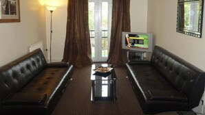 Apartment, 2 Bedrooms (5 Guests) | Living area | 32-inch TV with digital channels - OYO Arinza Apartments, Liverpool (Liverpool)