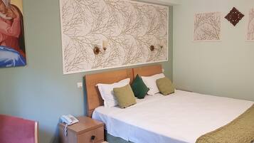 Frette Italian sheets, premium bedding, memory-foam beds, minibar