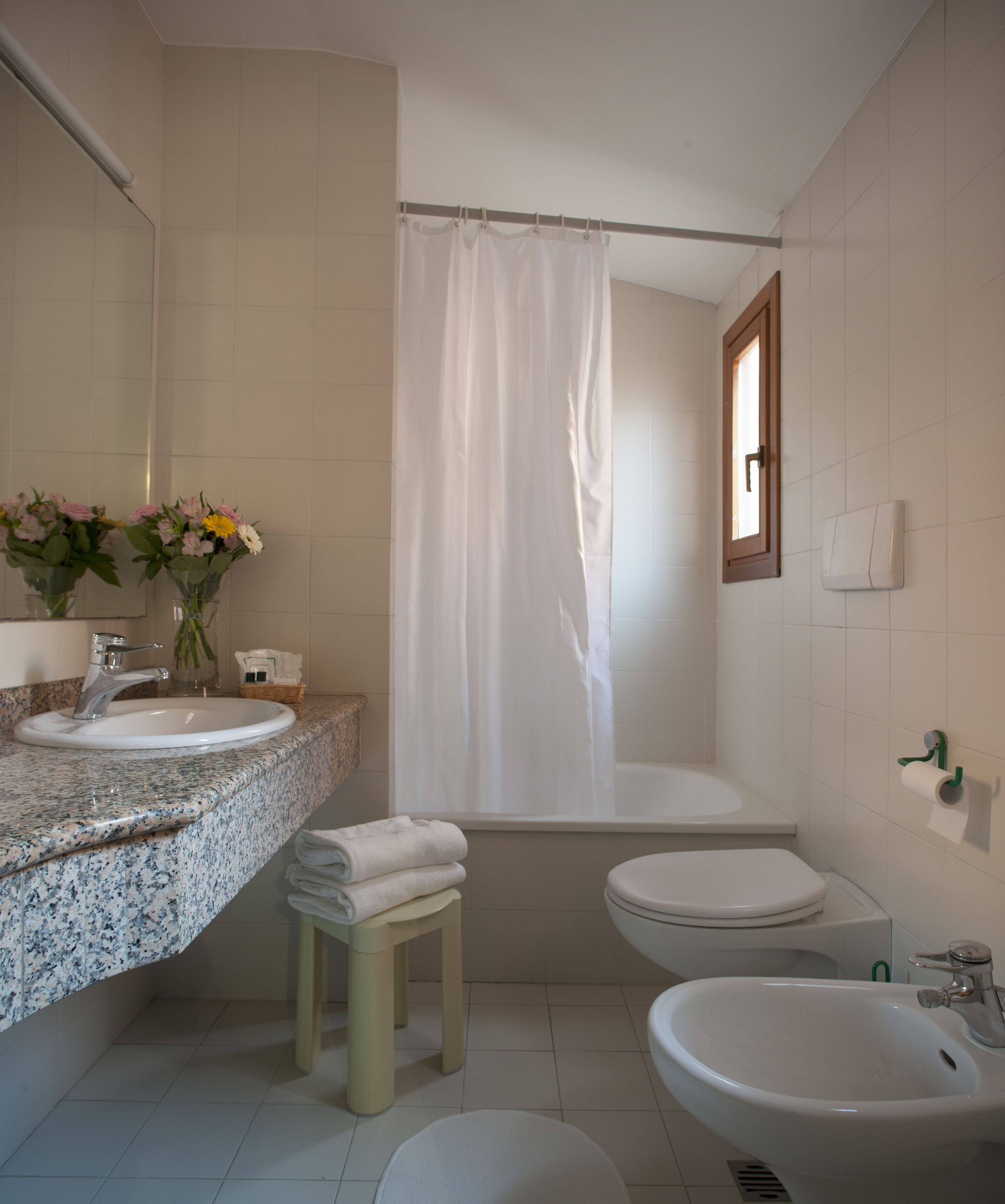 standard double or twin room | bathroom | rainfall showerhead, hair dryer, bidet, towels