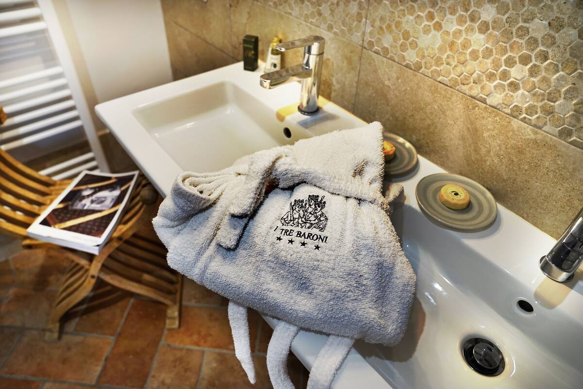 suite, jetted tub (lavander spa) | bathroom amenities | free toiletries, hair dryer, bidet, towels