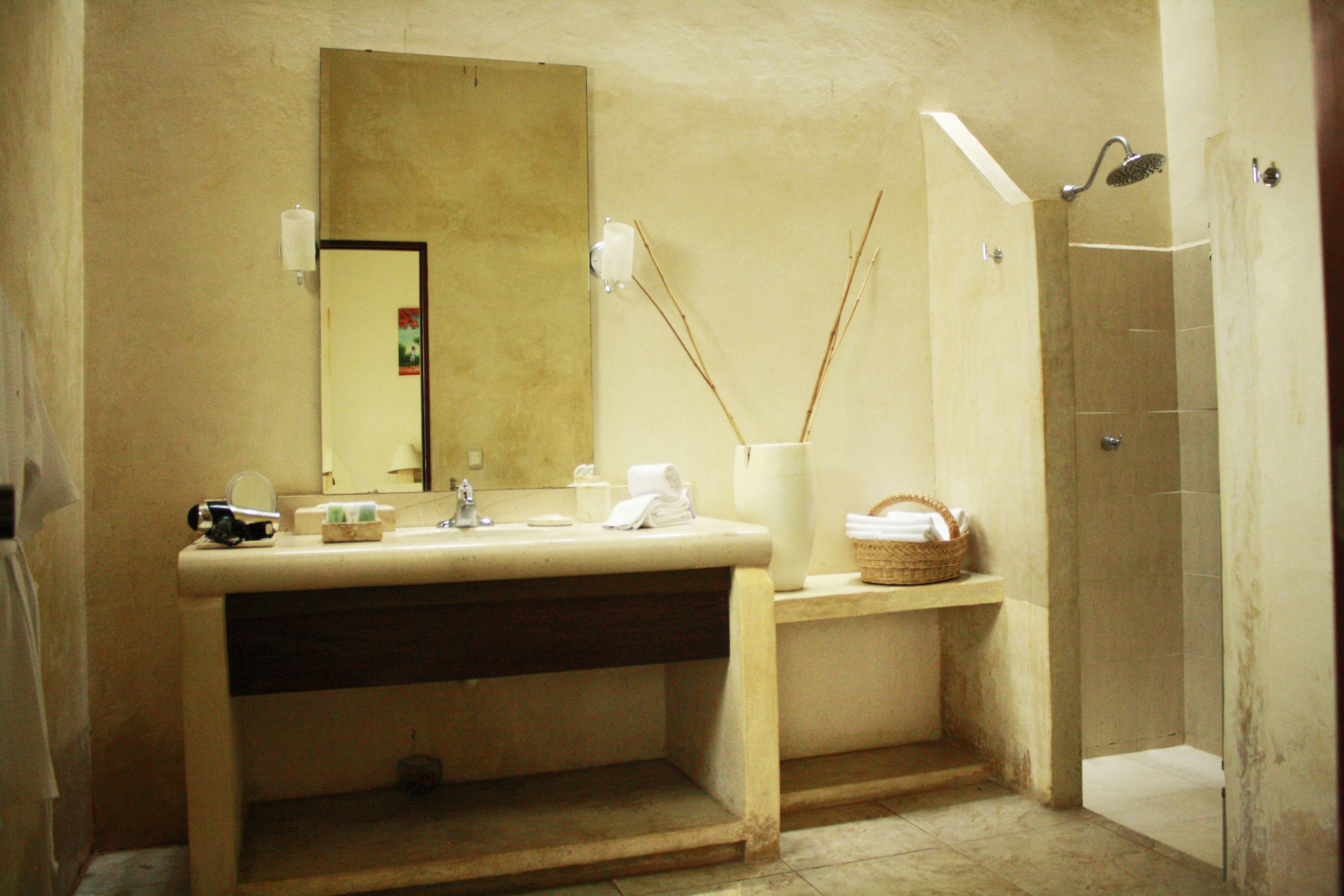 deluxe room, 1 king bed, private pool, courtyard area | bathroom | shower, free toiletries, hair dryer, towels