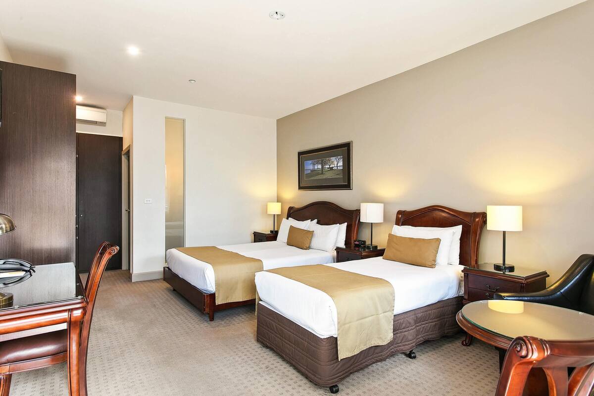 Room, Multiple Beds, Non Smoking | Minibar, in-room safe, desk, iron/ironing board