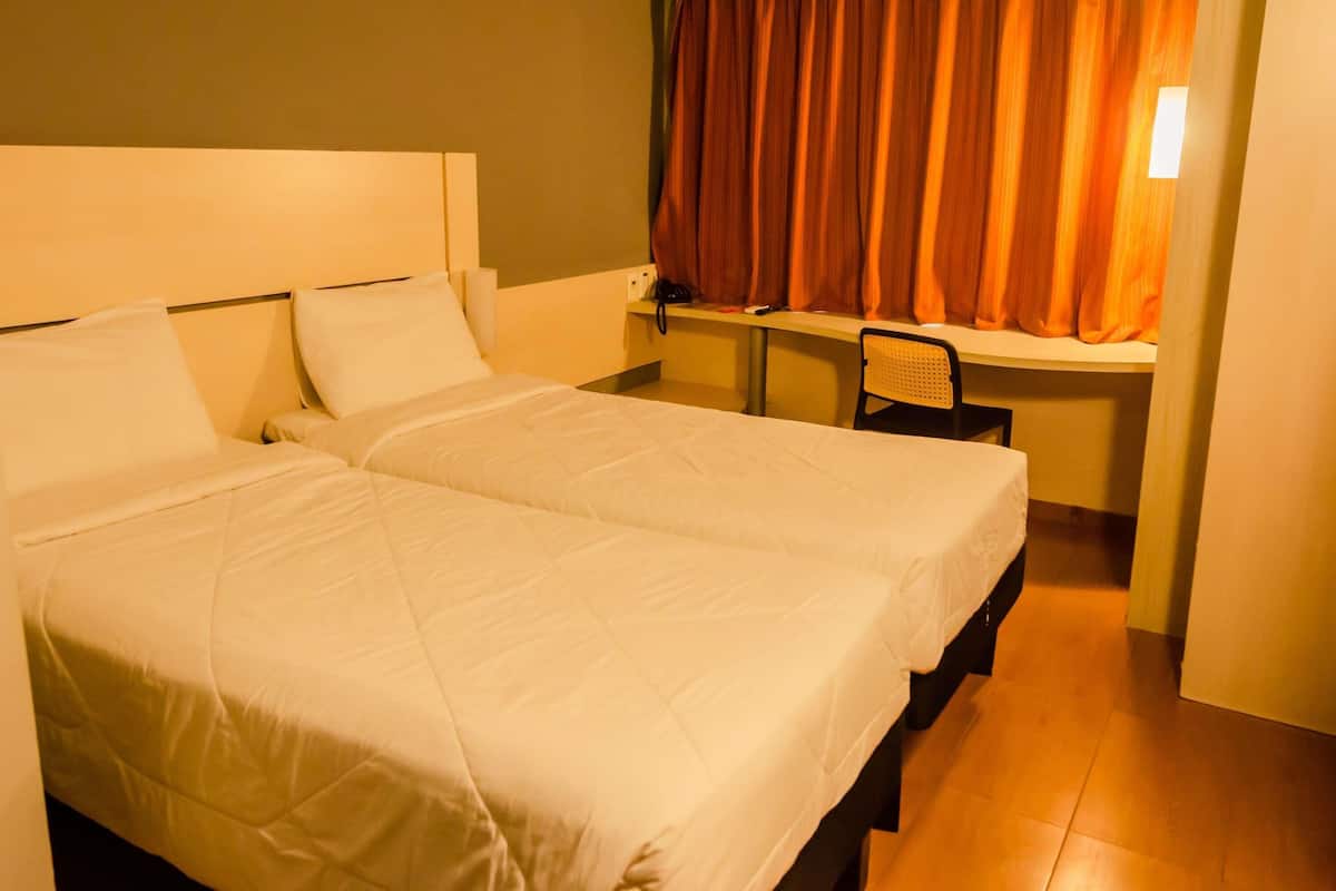 Classic Room, Multiple Beds | Minibar, in-room safe, desk, soundproofing