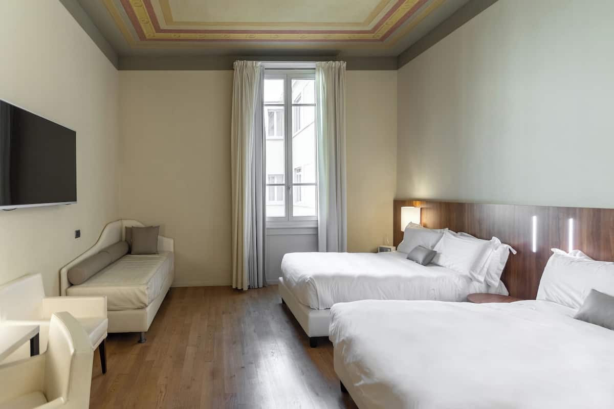 1 Schlafzimmer, hochwertige Bettwaren, Daunenbettdecken, Minibar