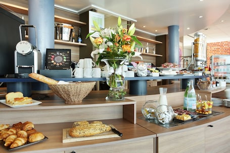 Daily buffet breakfast (EUR 13 per person)