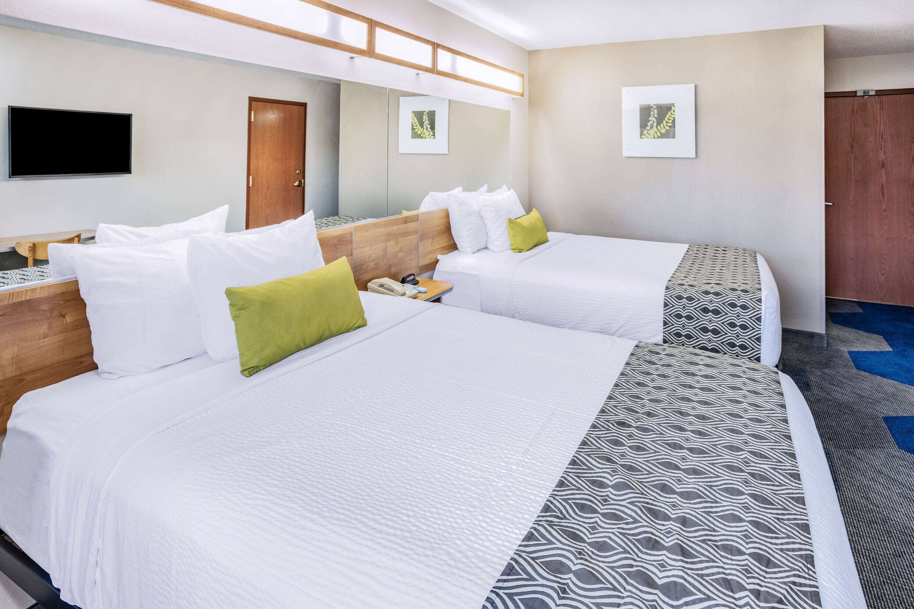 premium bedding, pillow-top beds, desk, iron/ironing board